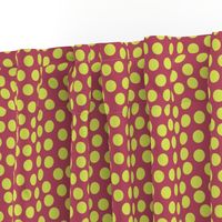 Lime green polka dots on a cherry red background.