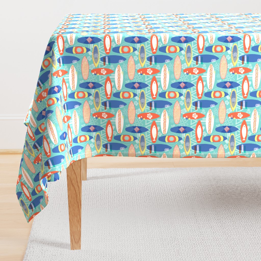 Surfboards blue orange yellow white on an aqua blue background. Triangles hibiscus flowers fishes. Hawaiian print. Distressed look.