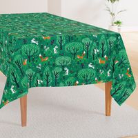 Foxes in the emerald forest in green