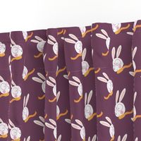 Rabbits with an orange scarf