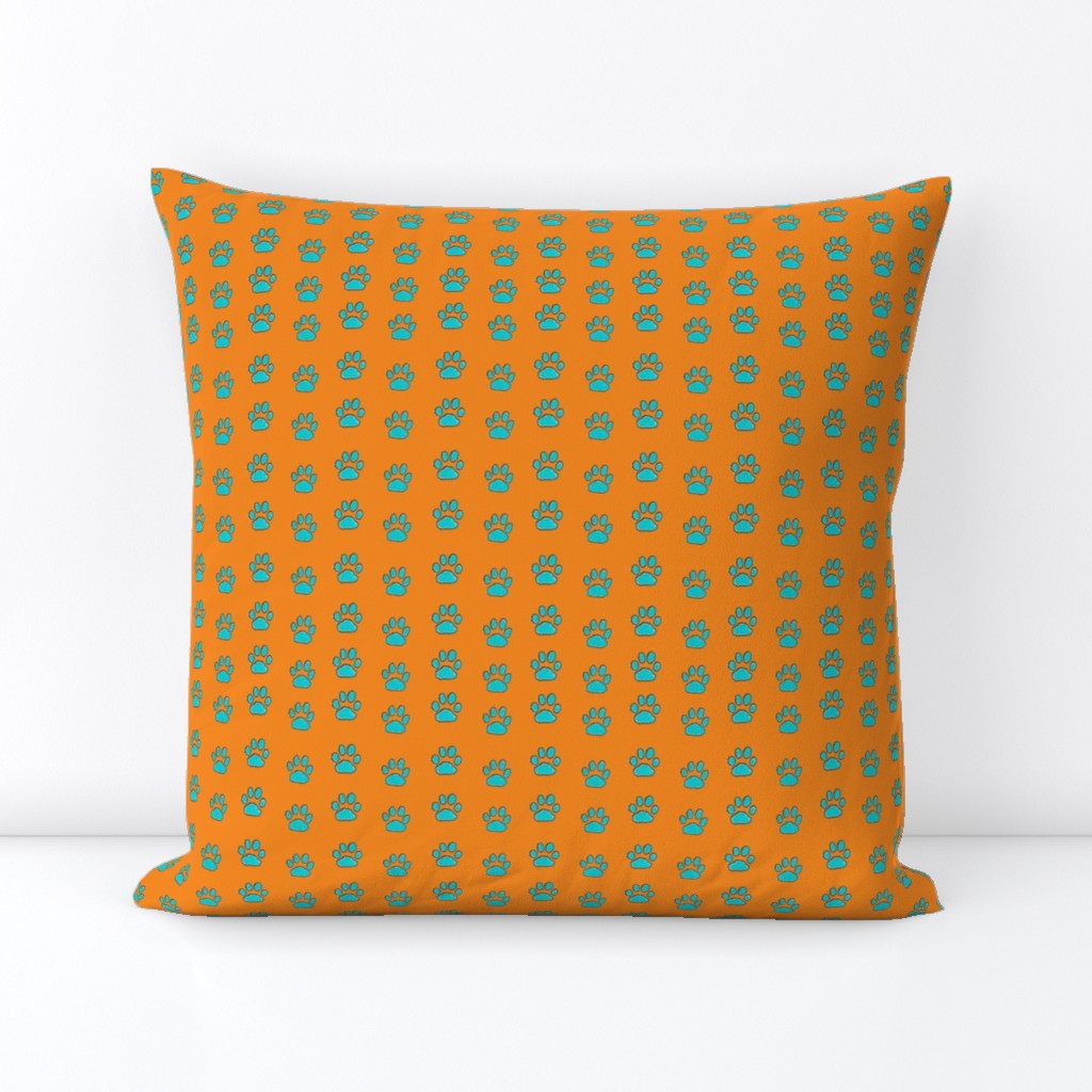 Orange and turquoise polka paws