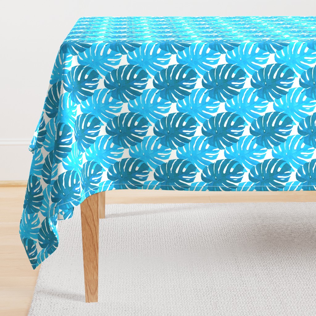 Watercolor blue and turquoise monstera leaves on white background