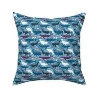 Whales. Blue background. Small scale