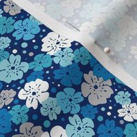 Blue, white and grey flowers with dots on navy background