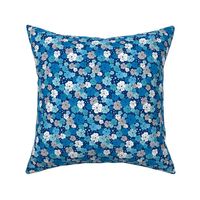 Blue, white and grey flowers with dots on navy background