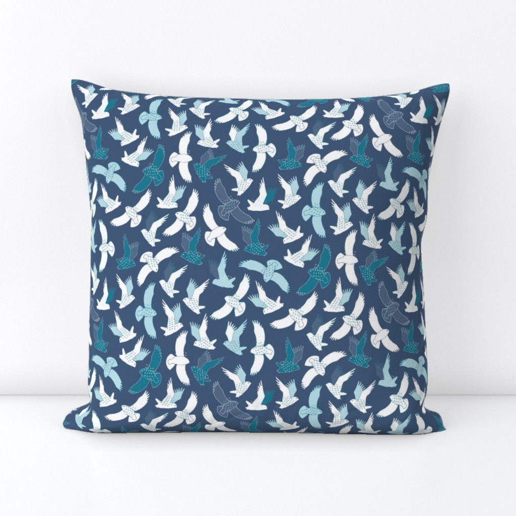 Snowy Owls in flight - white and teal on French navy