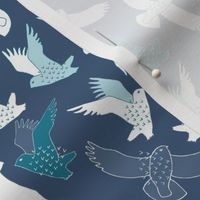 Snowy Owls in flight - white and teal on French navy