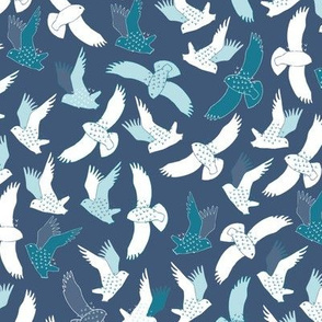 Snowy Owls in flight - white and teal on French navy