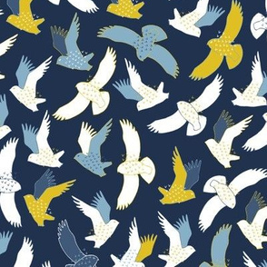 Snowy Owls In flight - blue and mustard