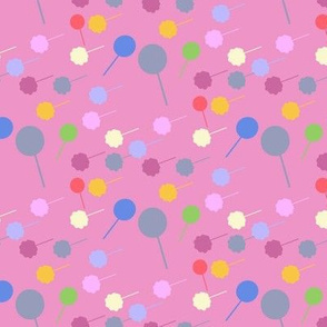Lollipops on pink background