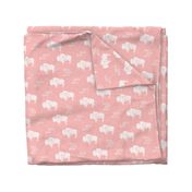 distressed buffalo on dark pink linen