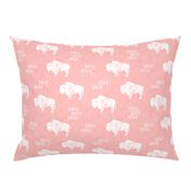 distressed buffalo on dark pink linen