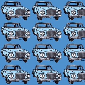 light blue double headlight Studebaker Lark on med blue