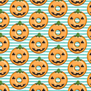 pumpkin donuts on teal stripes