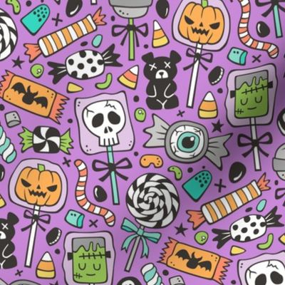 Trick or Treat Halloween Fall Candy on Dark Purple