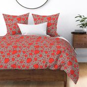 Red apples and polka dots on taupe, with a vintage, cheerful vibe.