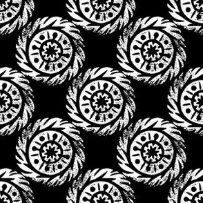 Linocut mandala pattern white on black