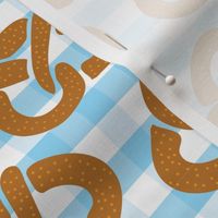 Pretzels on a blue and white checkered background