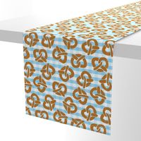 Pretzels on a blue and white checkered background