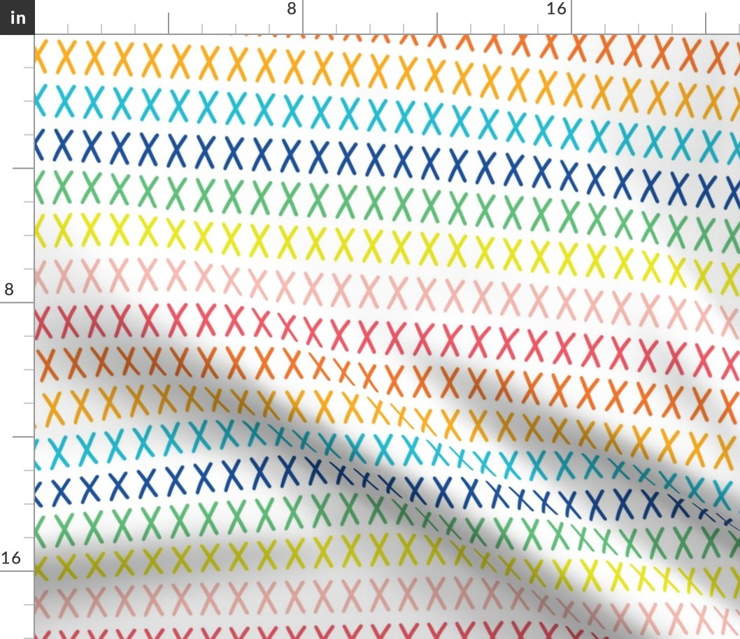 Rainbow cross stitch on white