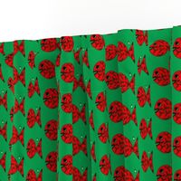 FI_7516_B “Deck the Halls with Bells of Holly Fish” red fish with emerald hunter green holly on green