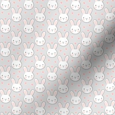 tiny bunny-faces-with-vintage pink hearts-on-grey
