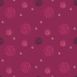Textured spot pattern on a raspberry base