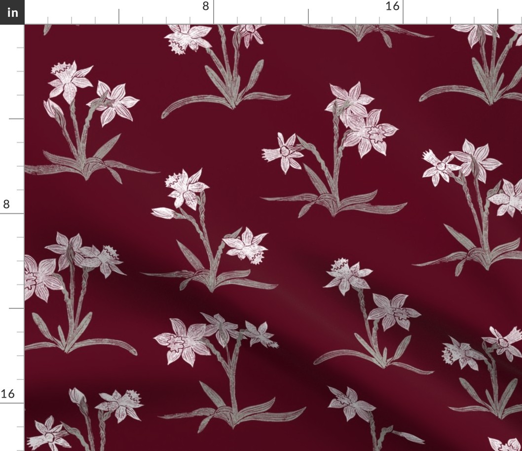 paperwhite narcissus on burgundy red