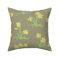 yellow daffodils on taupe