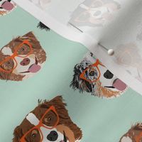 australian shepherds glasses fabric - cute dogs and glasses design - mint