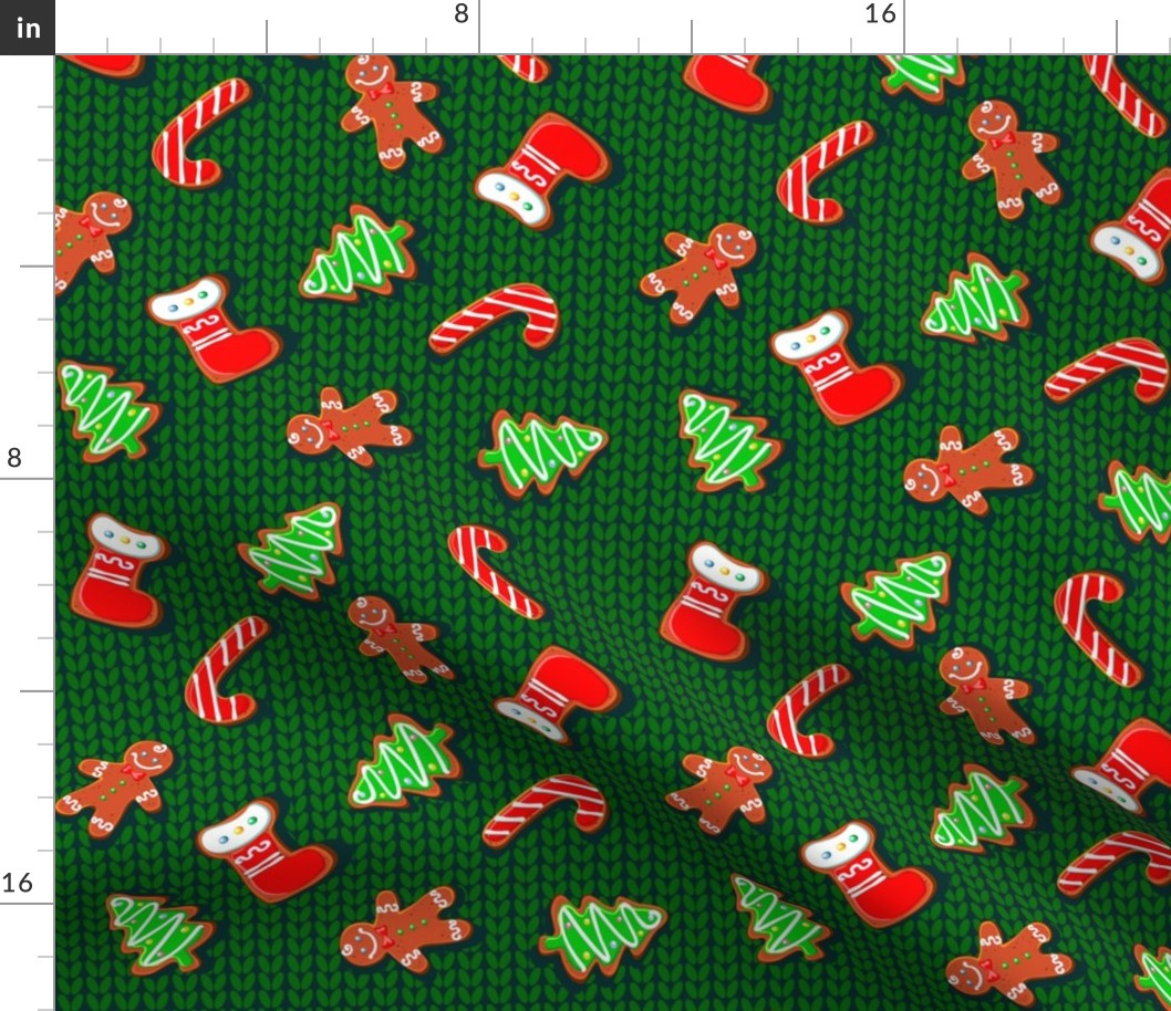 Christmas gingerbread cookies on a knitted background. A wool blanket. Christmas treat.