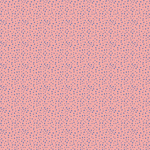 Blue spotted texture on a salmon pink base