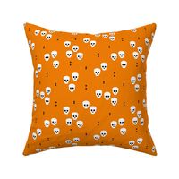 Minimal geometric skulls and arrows design halloween horror print gender neutral orange