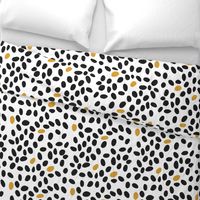 black and mustard spots