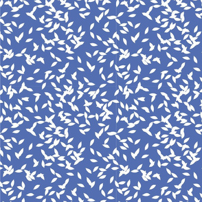 White leaves on blue background