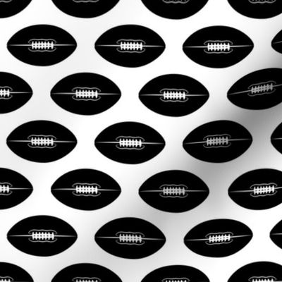 footballs (black)