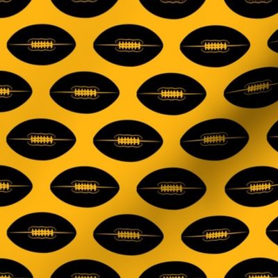 footballs (black on gold)