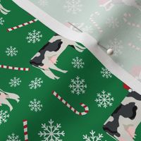 holstein cattle christmas candycane peppermint fabric green