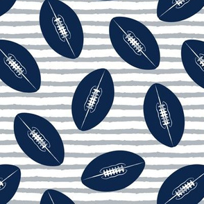 footballs  (blue and silver)