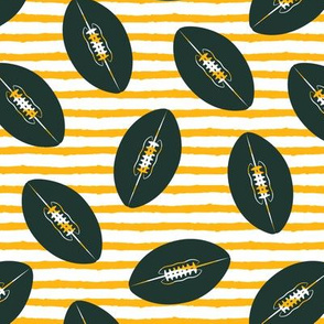 footballs  (green and gold)