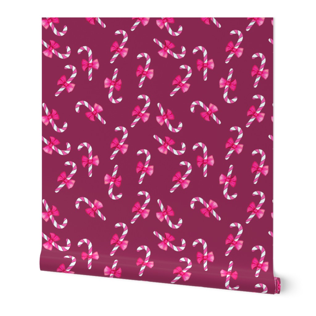 candy canes pink with bow on burgundy