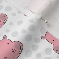 pink hippo faces with grey dots