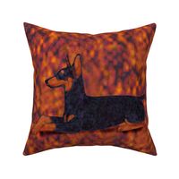Black and Rust Doberman Lying on Rusty Texture for Pillow