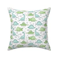 green and blue dinos on white