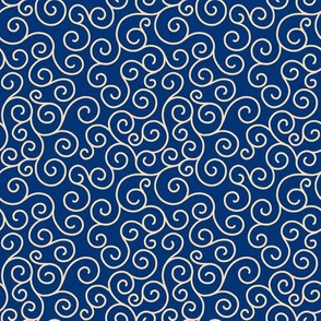 cream curlicues on dark blue