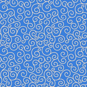 cream curlicues on blue