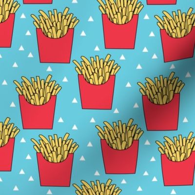 french-fries-with-red-box-on-teal