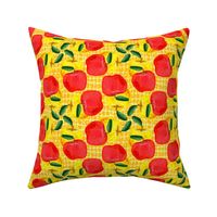 Red and Yellow Apples on Golden Yellow Mesh