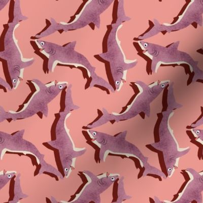 Tumbling Pink Sharks on Coral