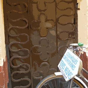Bike in front of Wrought Iron Grill in Front of Door, Collioure, France